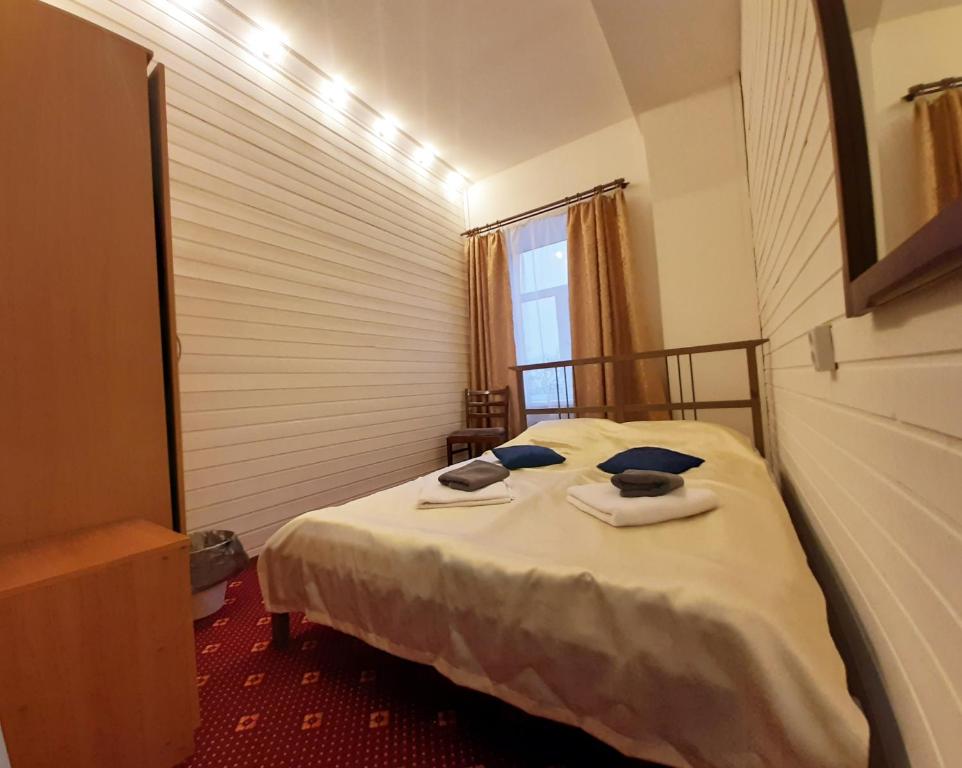 En eller flere senger på et rom på Svarog Art Hotel