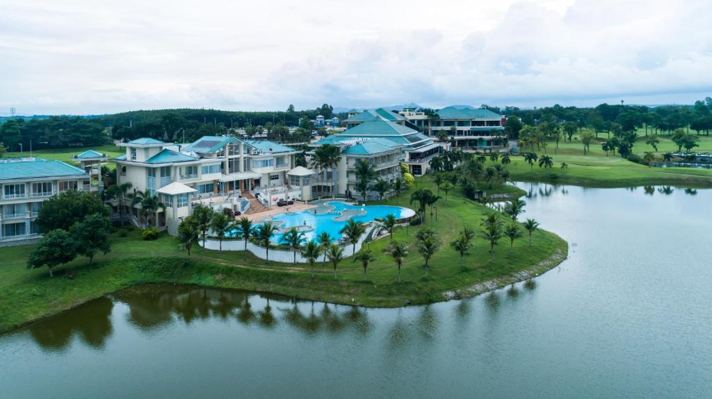 an aerial view of a resort with a body of water at Pattana Sports Resort in Si Racha