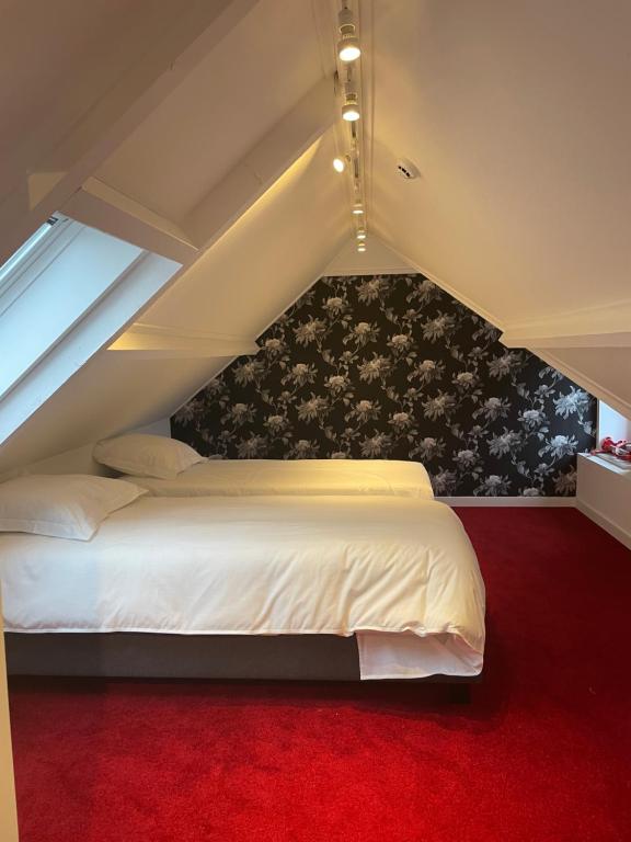 Postel nebo postele na pokoji v ubytování B&B Het Doctershoes