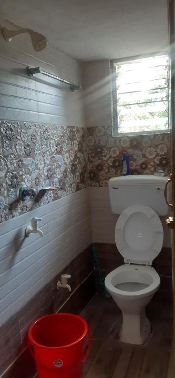 Koupelna v ubytování Sakshi Home Stay