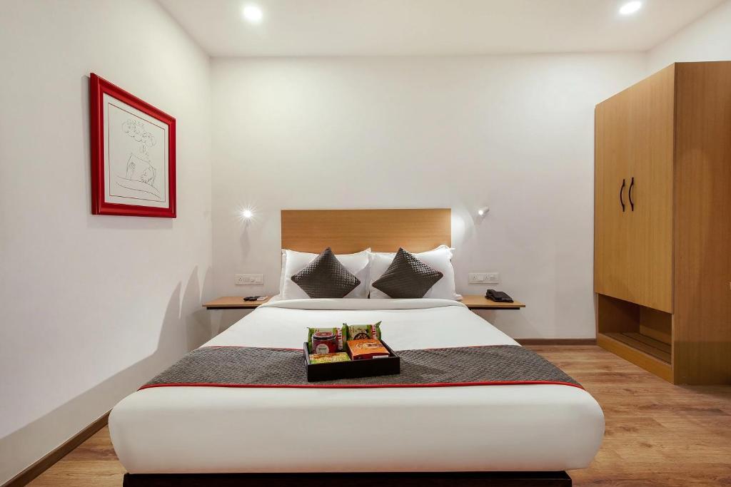Postel nebo postele na pokoji v ubytování Hotel The Onyx