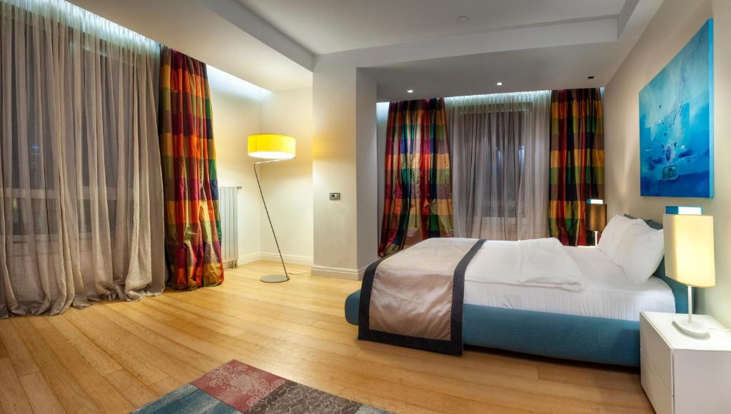 Postel nebo postele na pokoji v ubytování Armoni Residence Istanbul