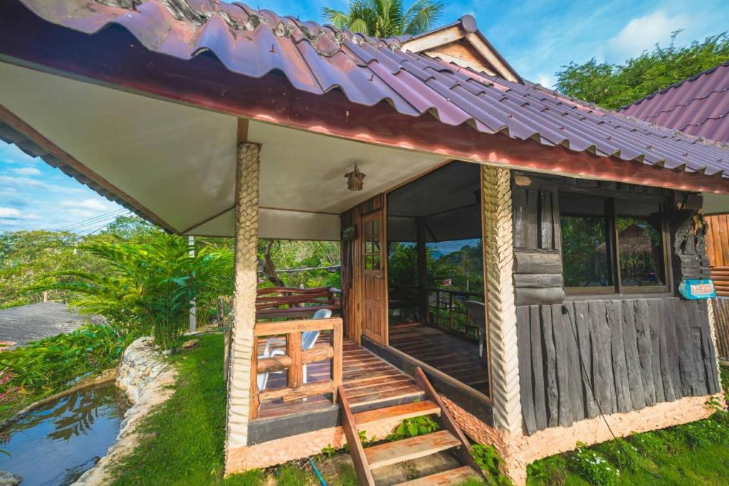 Zahrada ubytování NonKan HomeStay นอนกาญจน์ โฮมสเตย์