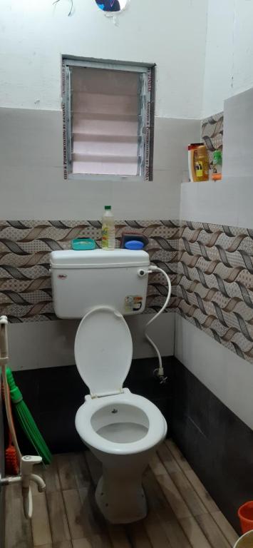 Koupelna v ubytování Sakshi Home Stay