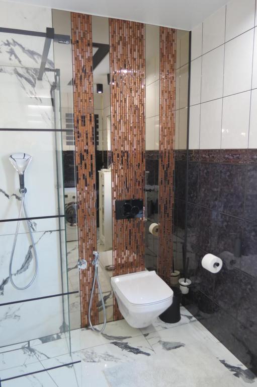 Kúpeľňa v ubytovaní ApartPodhale
