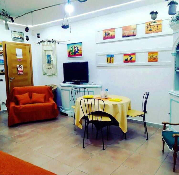 TV a/nebo společenská místnost v ubytování B&B Magna Grecia