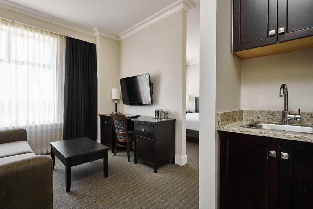 Kuchyň nebo kuchyňský kout v ubytování Hotel Rialto