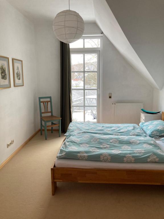 Postel nebo postele na pokoji v ubytování Auberge Tabarz Inselsberg