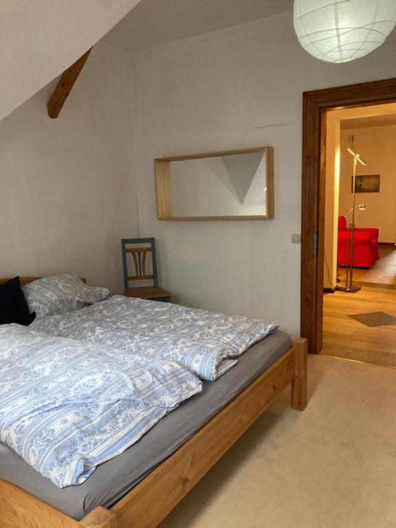 Postel nebo postele na pokoji v ubytování Auberge Tabarz Inselsberg