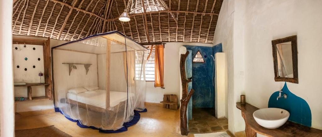 Vannituba majutusasutuses Distant Relatives Ecolodge & Backpackers