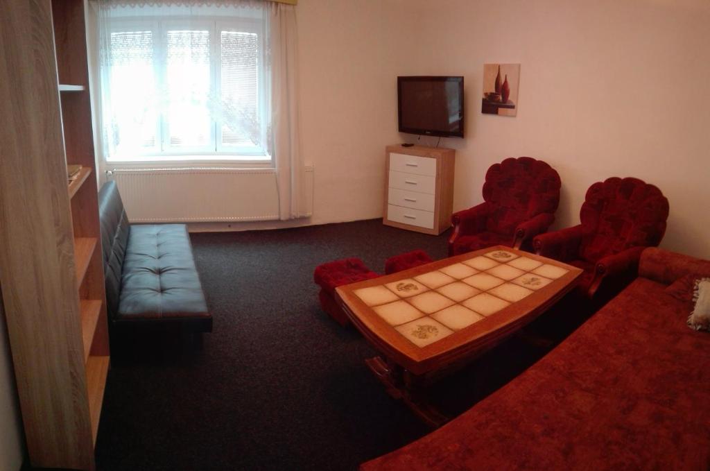 Telewizja i/lub zestaw kina domowego w obiekcie Apartmán Saxán Smržovka