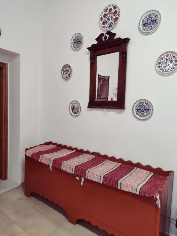 Postel nebo postele na pokoji v ubytování Archangelos Family House