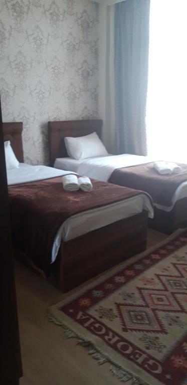 Postel nebo postele na pokoji v ubytování Hotel IVERIA