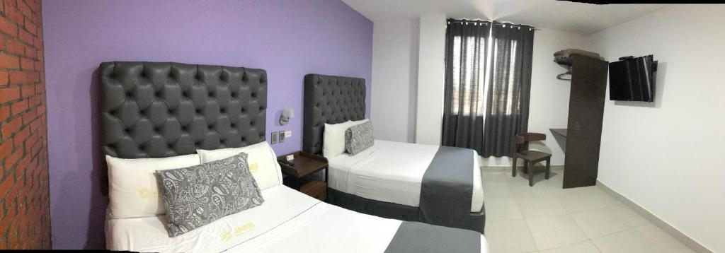 TV a/nebo společenská místnost v ubytování Hotel Jar8 Acuario enfrente al Acuario de Veracruz