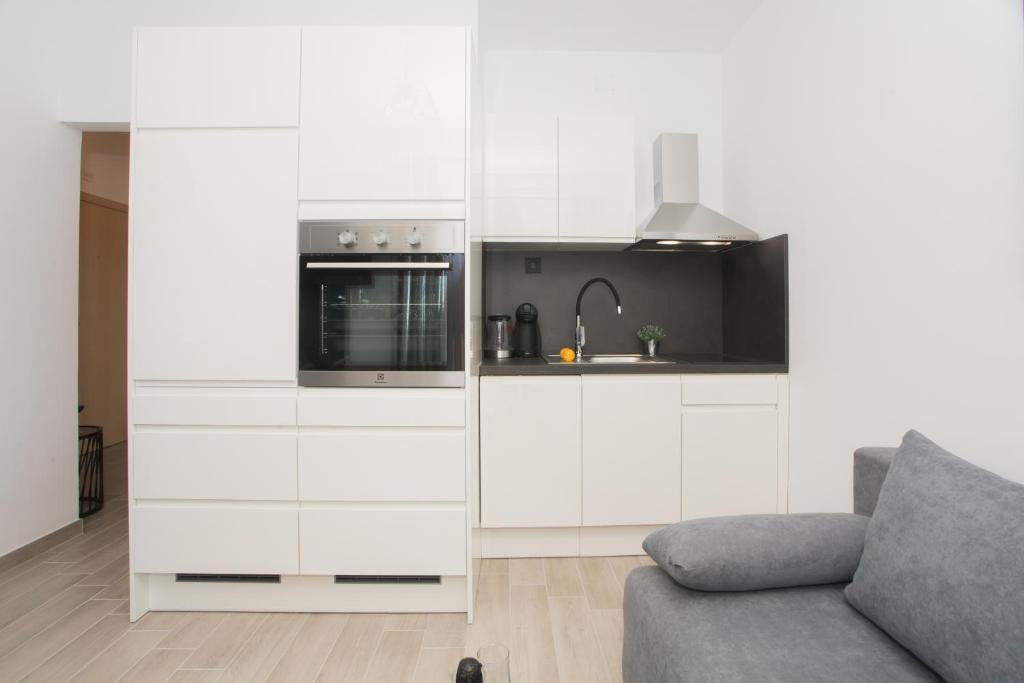 Kuchyň nebo kuchyňský kout v ubytování Apartmani Rišpet