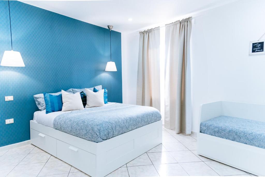 Posteľ alebo postele v izbe v ubytovaní Casa Aragona b&b