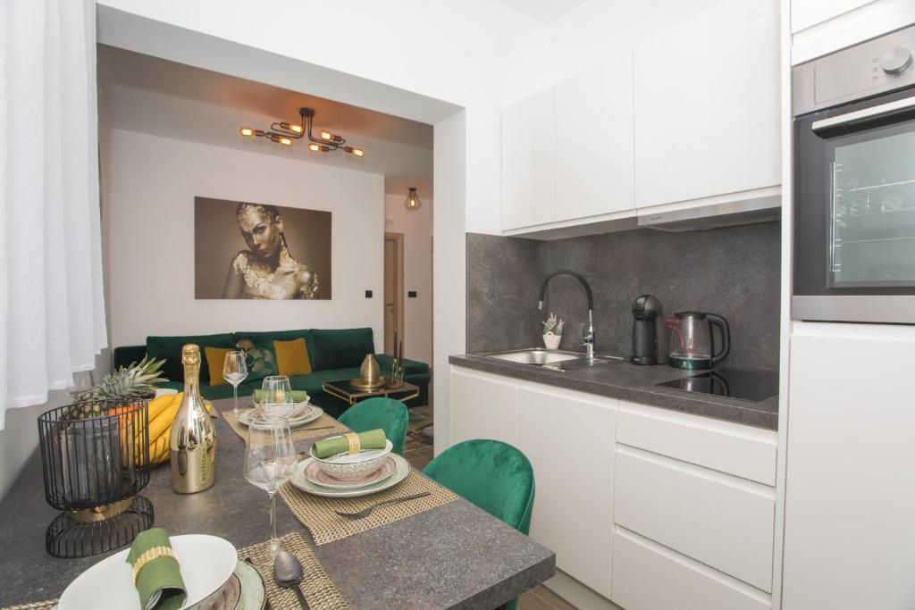 Kuchyň nebo kuchyňský kout v ubytování Apartmani Rišpet