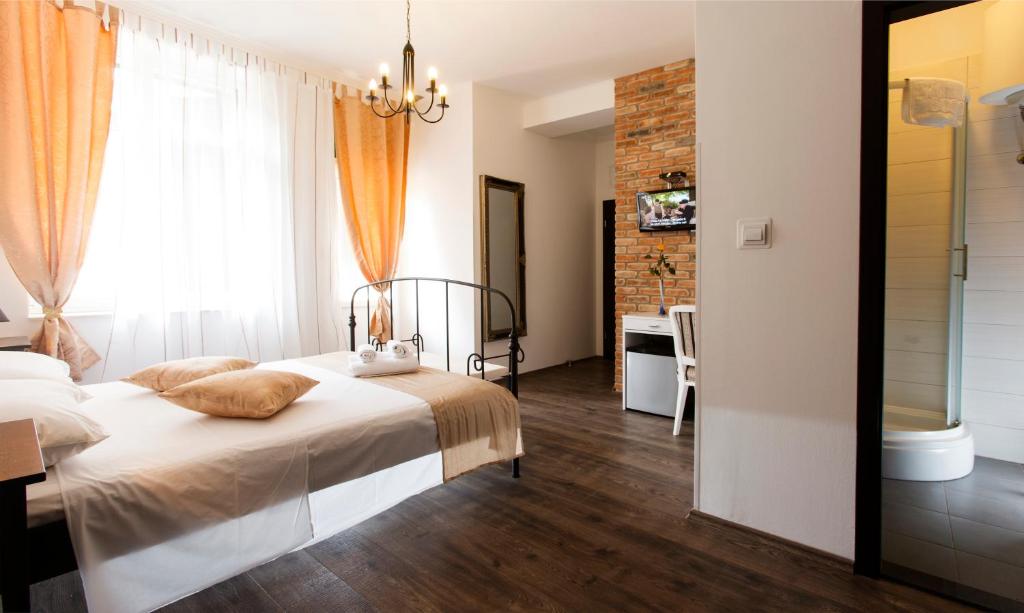 Posteľ alebo postele v izbe v ubytovaní Prior Suites Split