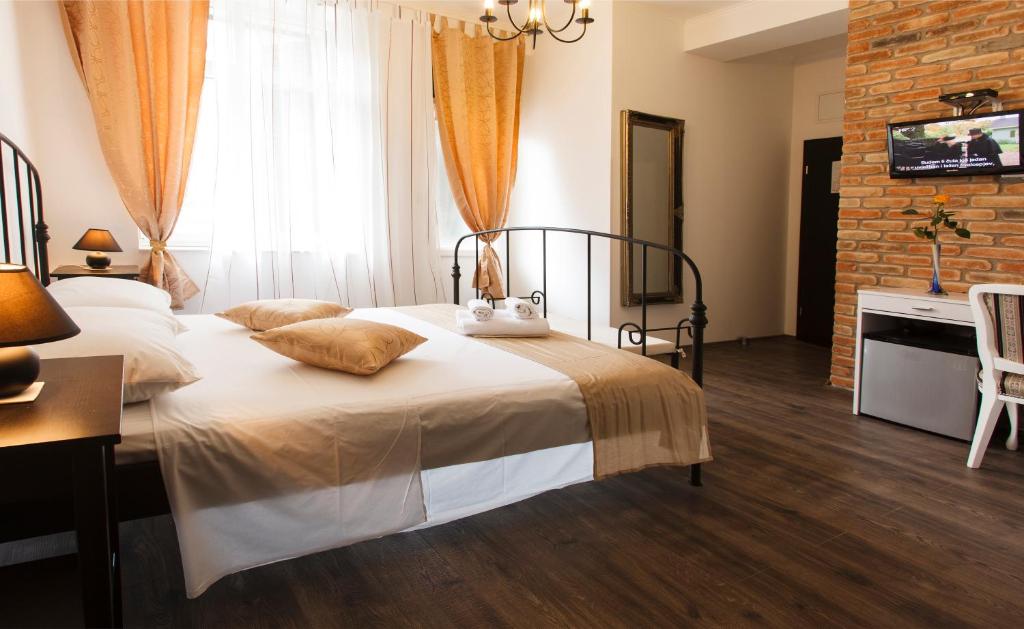 Posteľ alebo postele v izbe v ubytovaní Prior Suites Split