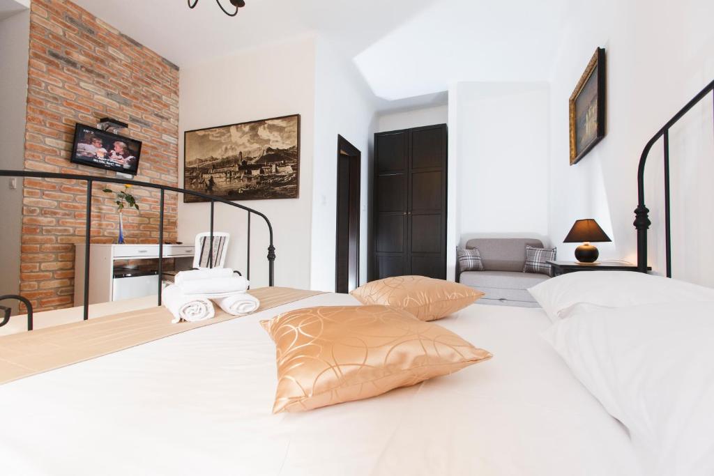 Posteľ alebo postele v izbe v ubytovaní Prior Suites Split