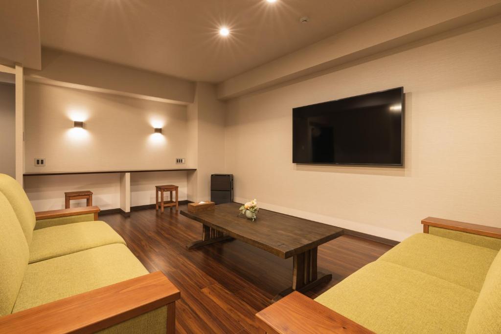 TV a/nebo společenská místnost v ubytování Hotel Iori
