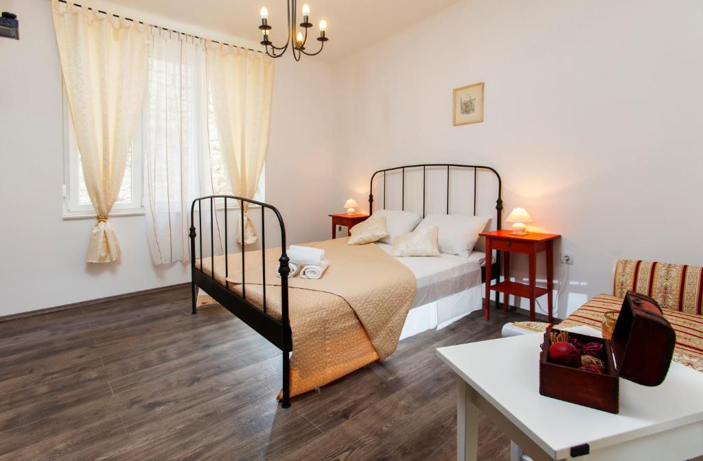 Posteľ alebo postele v izbe v ubytovaní Prior Suites Split