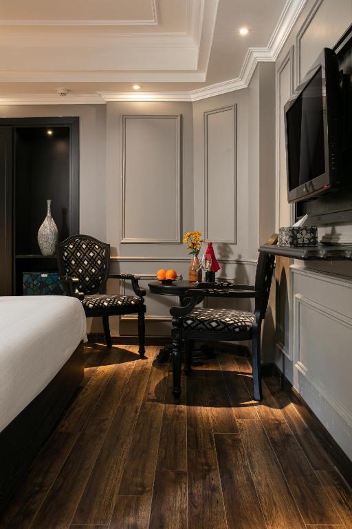 TV a/nebo společenská místnost v ubytování Scent Premium Hotel