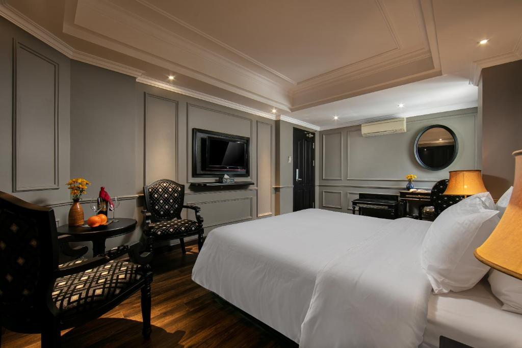 TV a/nebo společenská místnost v ubytování Scent Premium Hotel