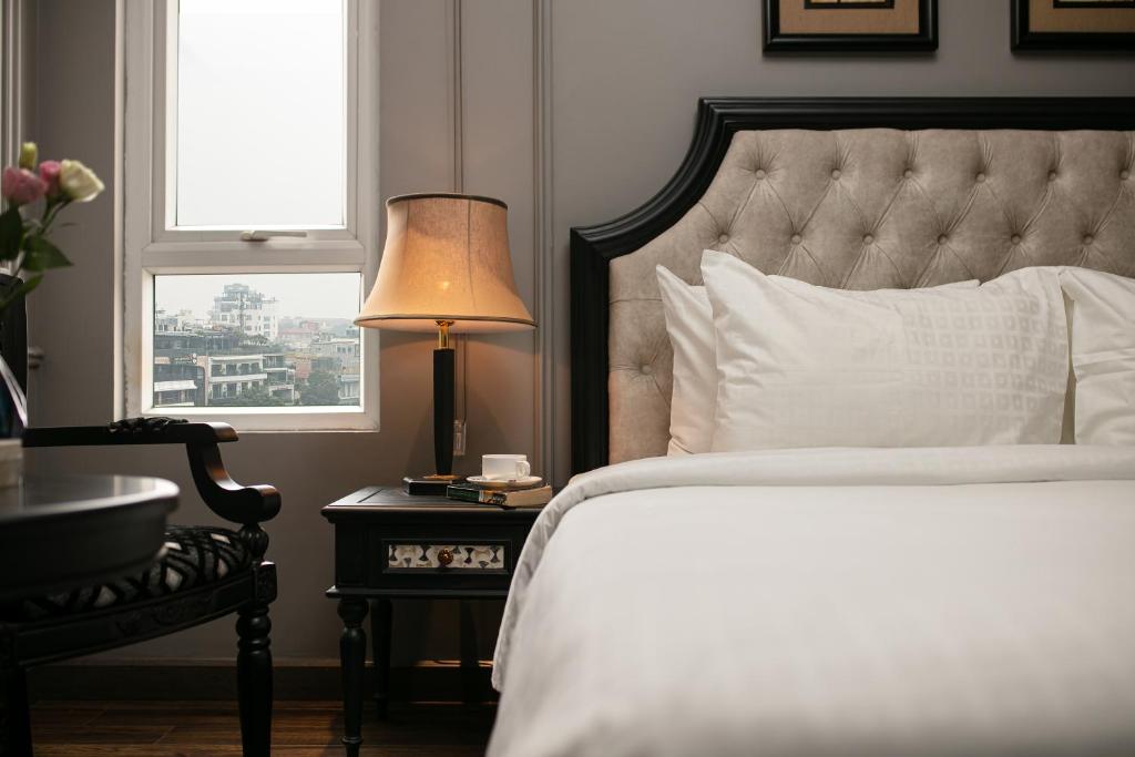 Postel nebo postele na pokoji v ubytování Scent Premium Hotel