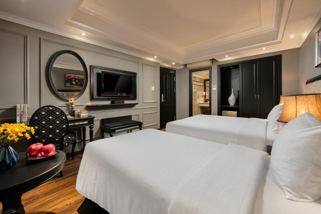 TV a/nebo společenská místnost v ubytování Scent Premium Hotel
