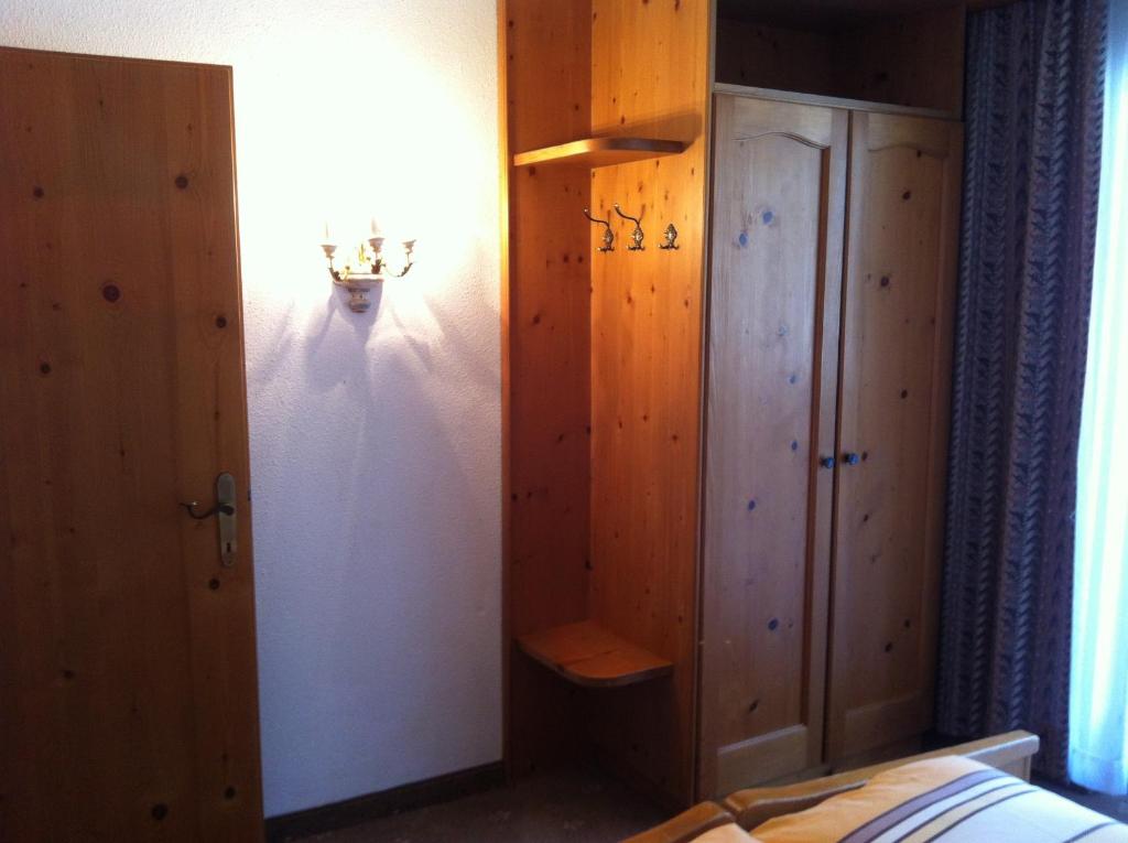 Postel nebo postele na pokoji v ubytování Hotel Garni Pfandl