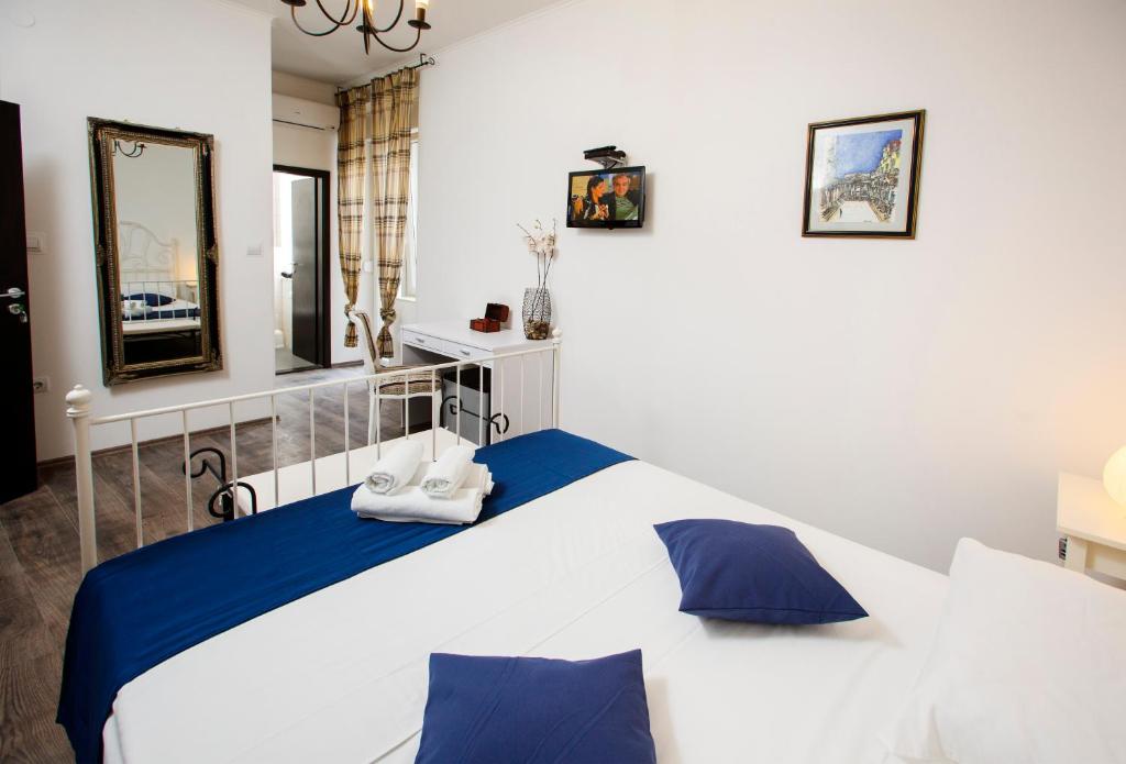 Posteľ alebo postele v izbe v ubytovaní Prior Suites Split