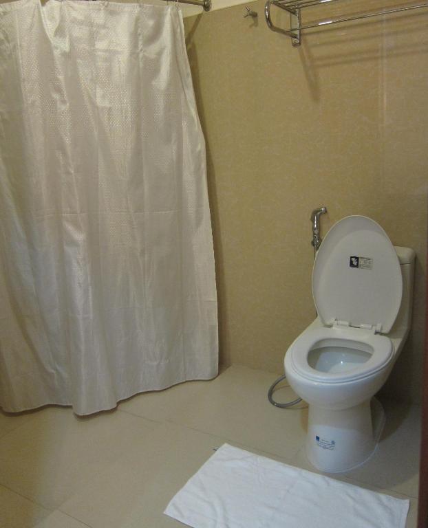 Koupelna v ubytování Thirdys Tourist Inn