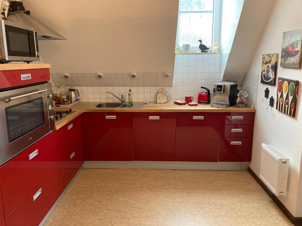 Kuchyň nebo kuchyňský kout v ubytování Auberge Tabarz Inselsberg