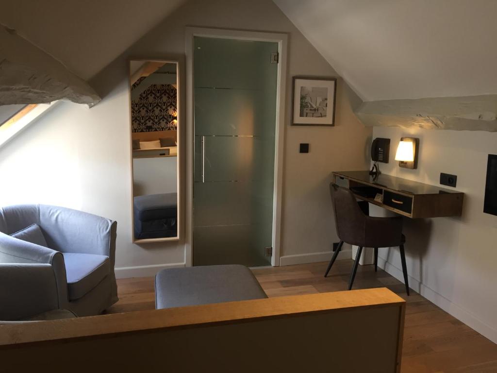 Posezení v ubytování Hotel le Fenil