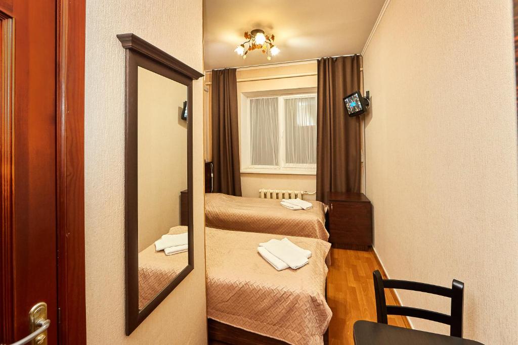 Postel nebo postele na pokoji v ubytování Hotel Barbaris