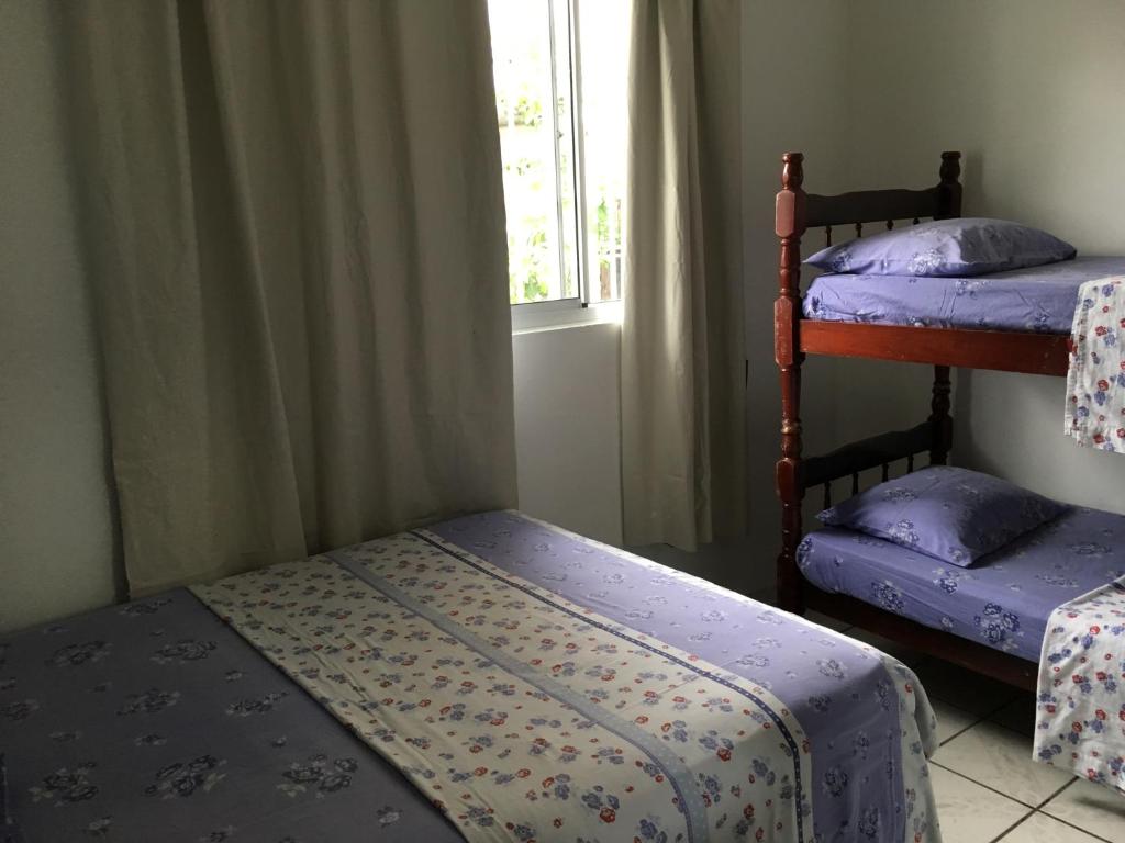  Apartamento com piscina perto da praia