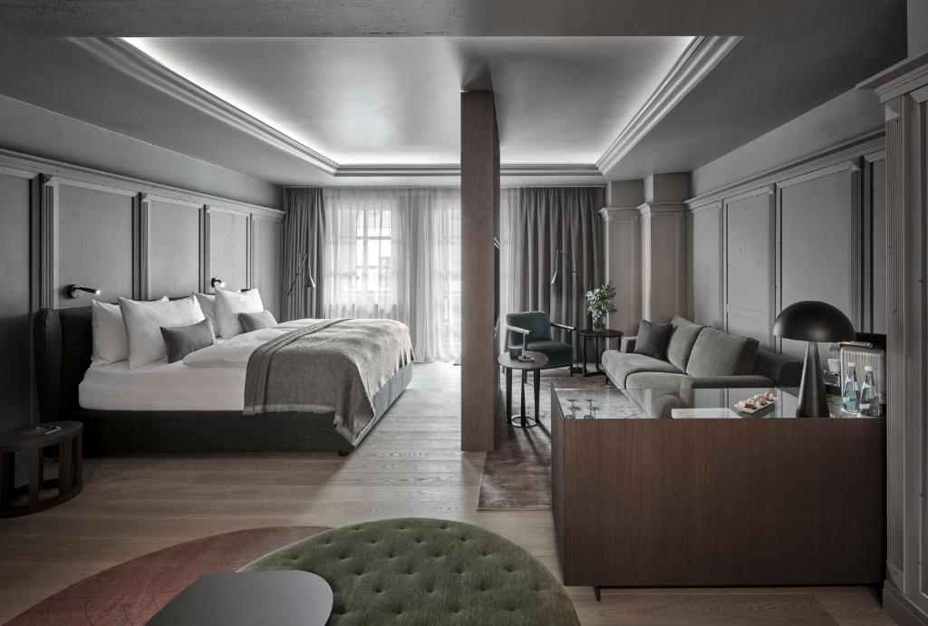 Postel nebo postele na pokoji v ubytování Hotel Weisses Roessl