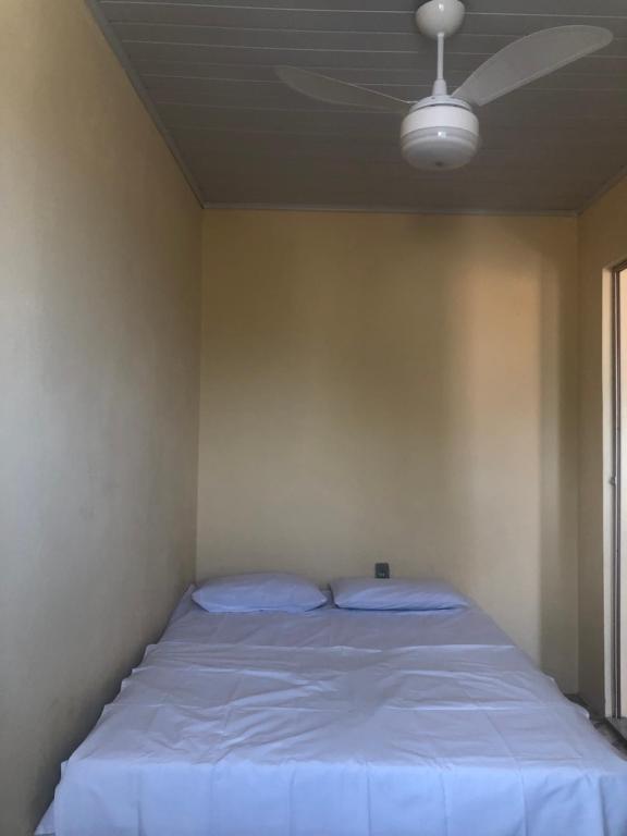 Giường trong phòng chung tại Casa na Praia de Barra do Gil