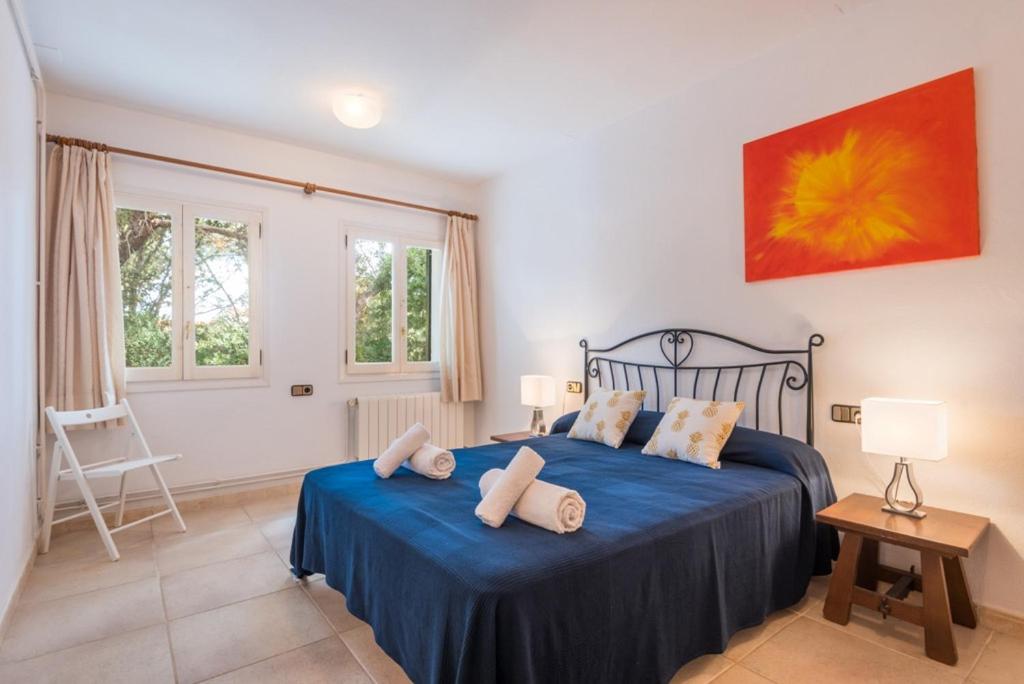 Postel nebo postele na pokoji v ubytování Villa Llevant Galdana