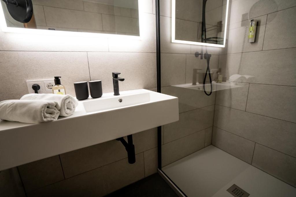 Koupelna v ubytování Hotel Christina