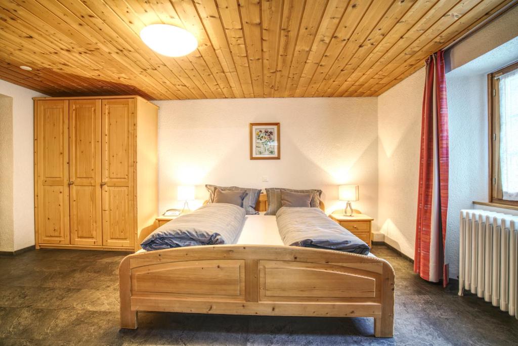 Postel nebo postele na pokoji v ubytování Hotel Bellevue