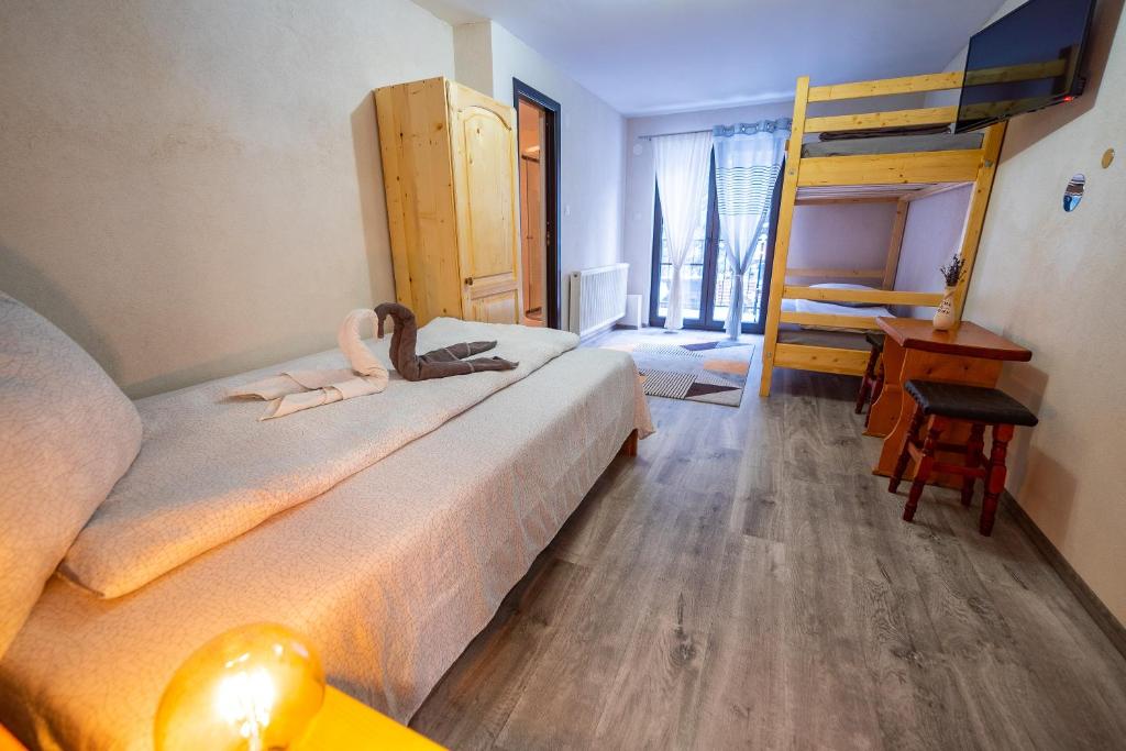 Postel nebo postele na pokoji v ubytování Casa Danielle
