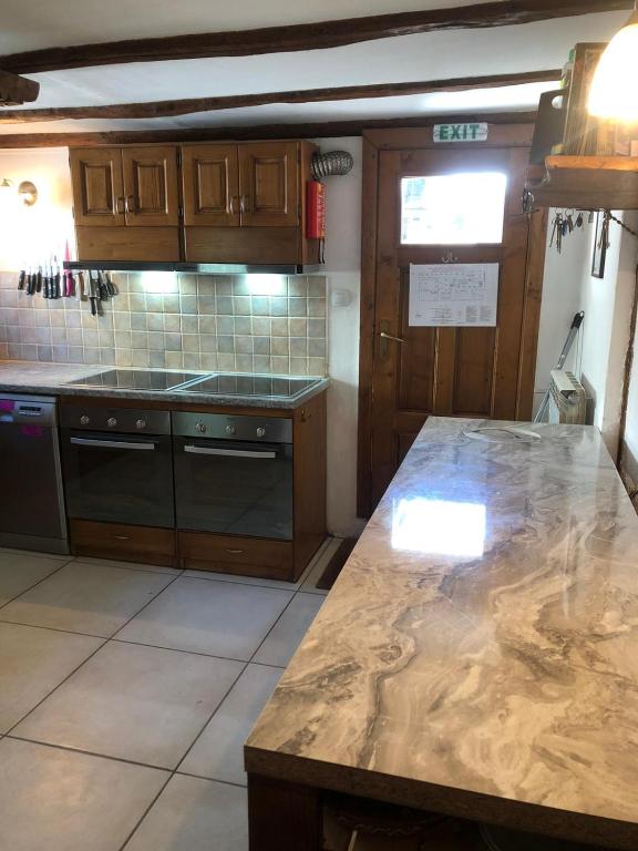 Kuchyň nebo kuchyňský kout v ubytování Chalet Jora - Total Chalets