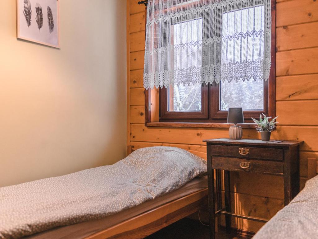 Letto o letti in una camera di WANATÓWKA