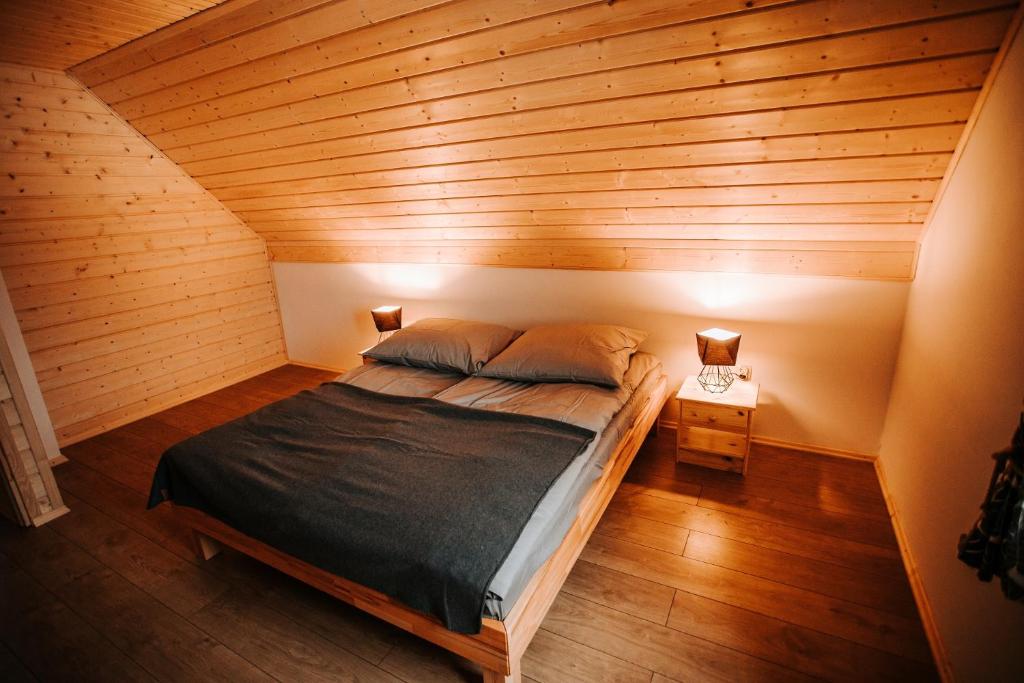 Postel nebo postele na pokoji v ubytování Holickie Berdo