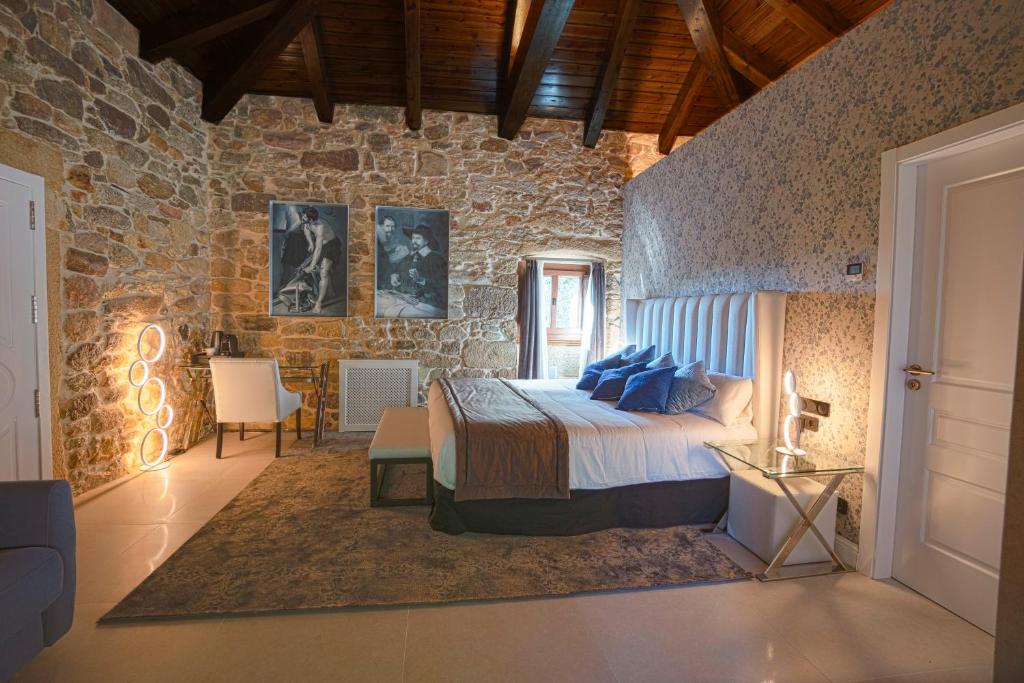 Posteľ alebo postele v izbe v ubytovaní Hotel As Torres da Hermida