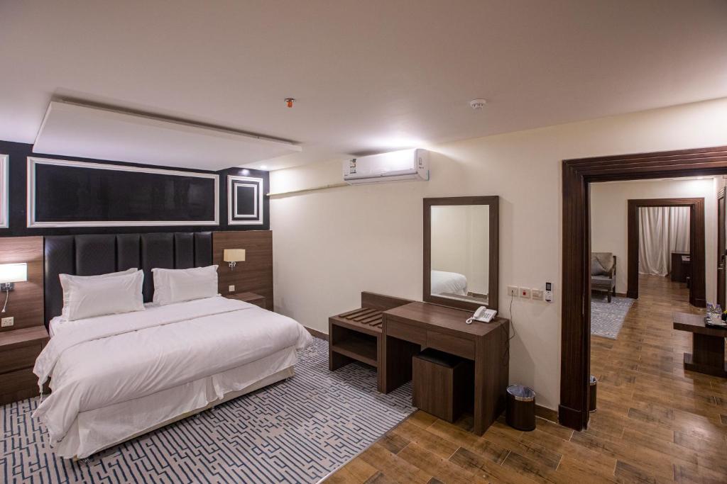 Postel nebo postele na pokoji v ubytování Olive Tree Hotel
