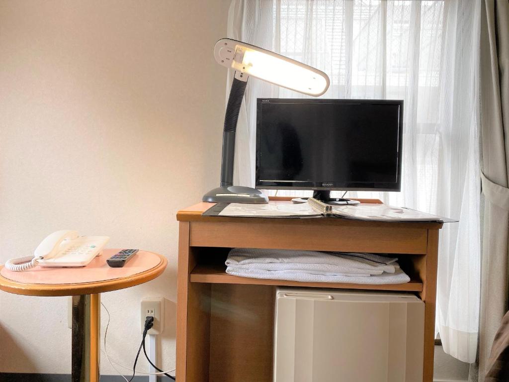 TV a/nebo společenská místnost v ubytování Sakura Hotel Hatagaya