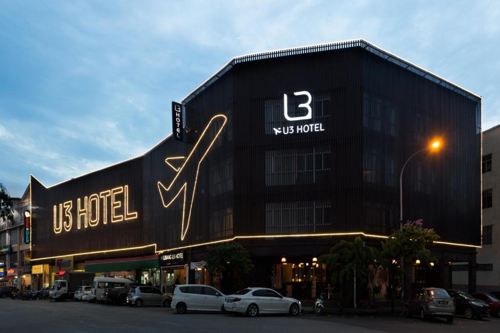 a large building with a sign on the side of it at U3 HOTEL in Subang Jaya